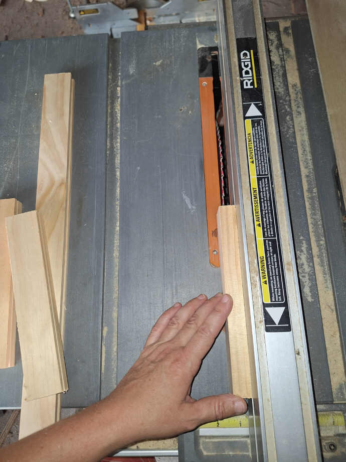 cutting the groove in the cabinet frame to make a tongue and groove cabinet door