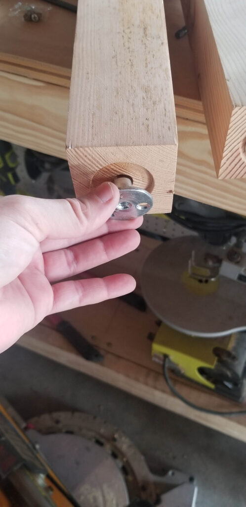 placing the mounting pad into the bathroom vanity leg