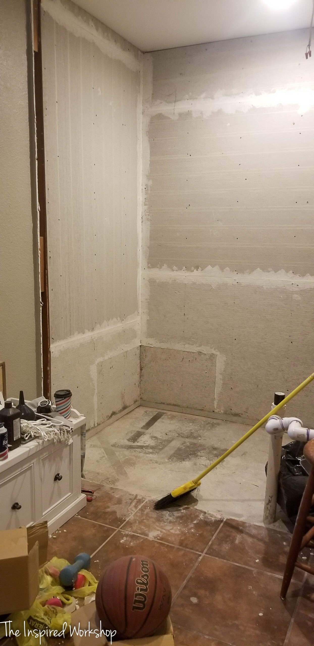 before image of the bathroom a completely unfinished space
