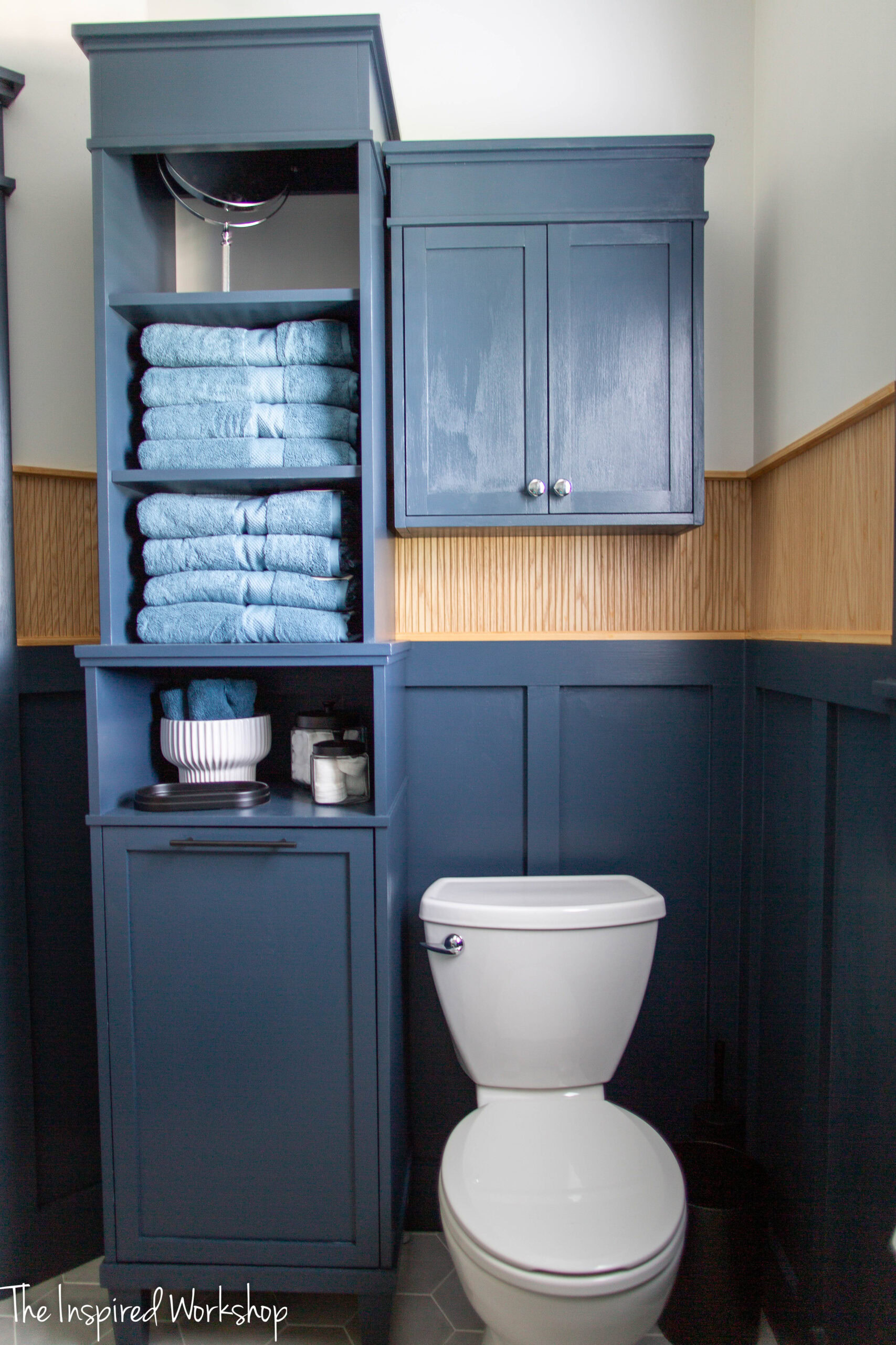 linen cabinet by the toilet
