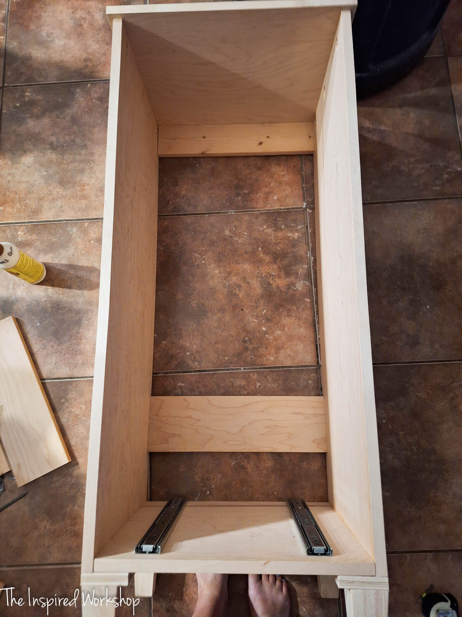 base of the linen cabinet being built