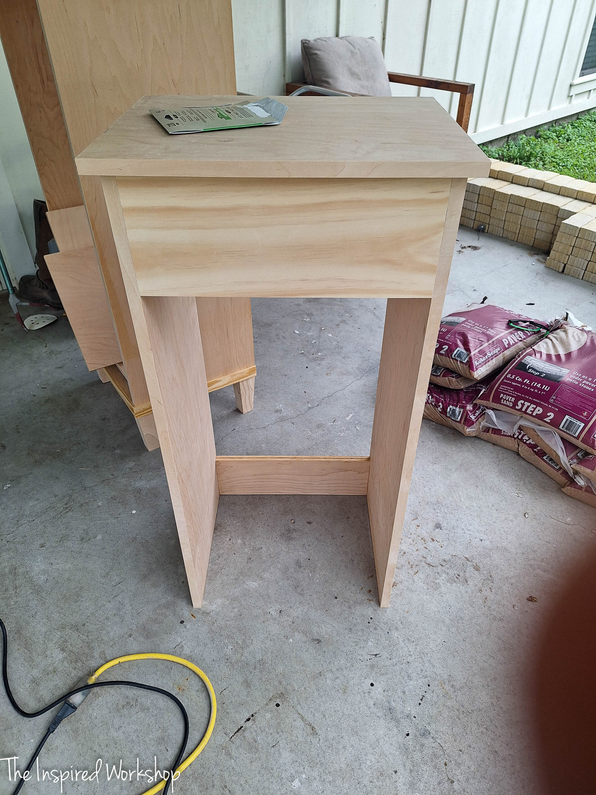 adding the top to the shelves of the linen cabinet