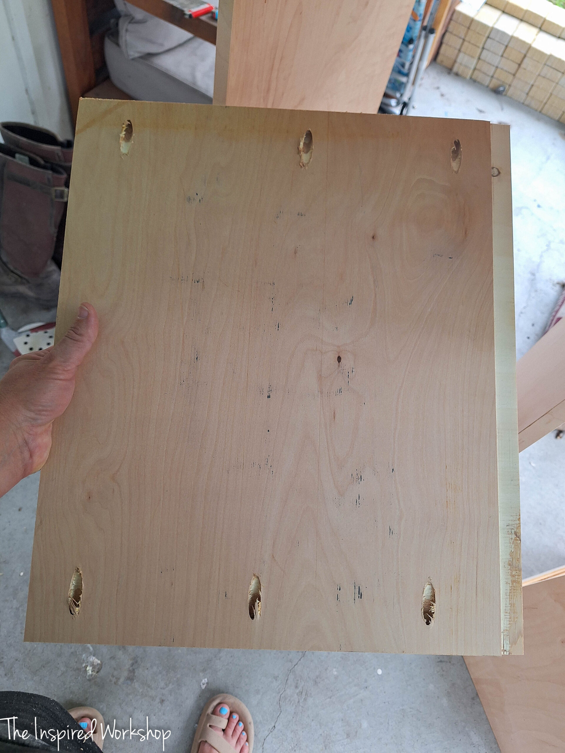 shelf of the linen cabinet before installing