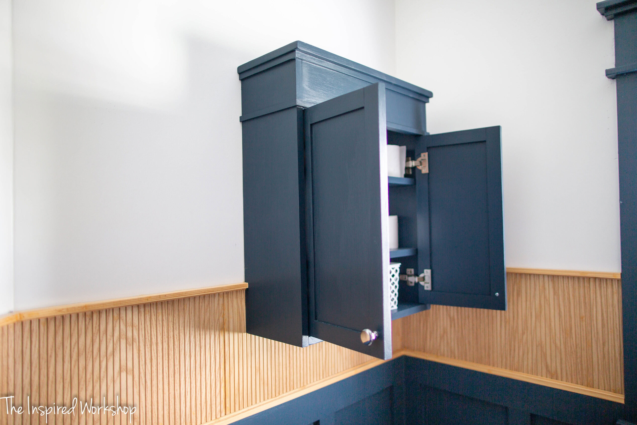 over the toilet cabinet open