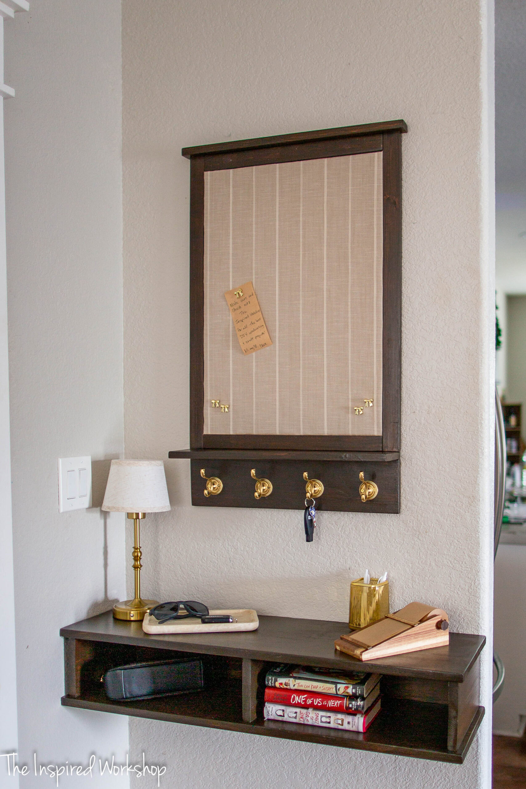 close up of the diy cork bulletin board with hooks