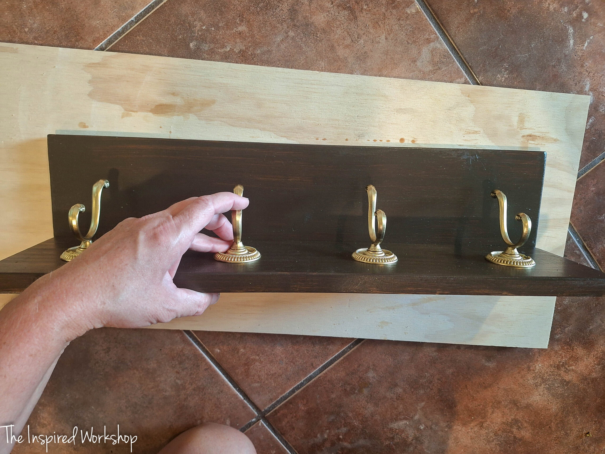 attaching the hook board to the shelf board