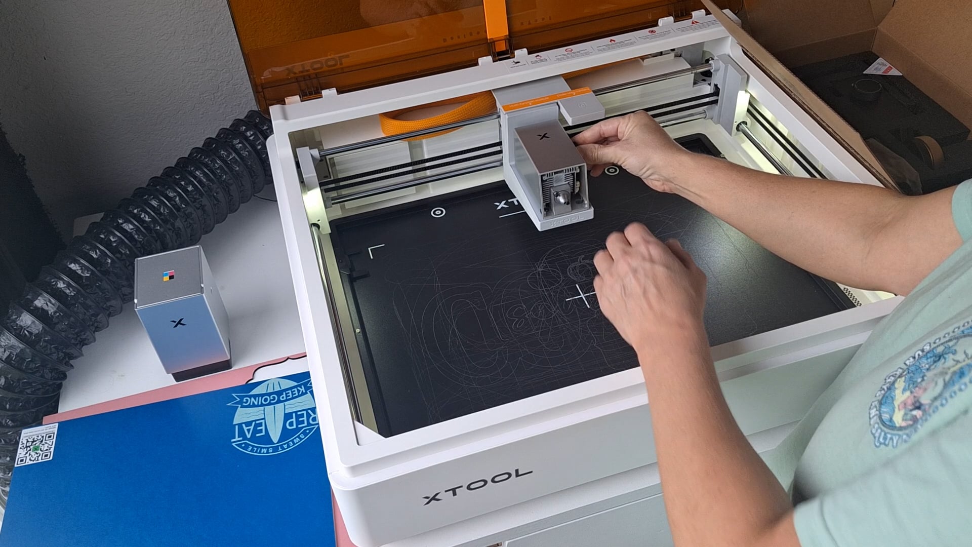 plugging the laser module back in on the horizontal plate to use the rotary attachment to engrave on cylindrical items
