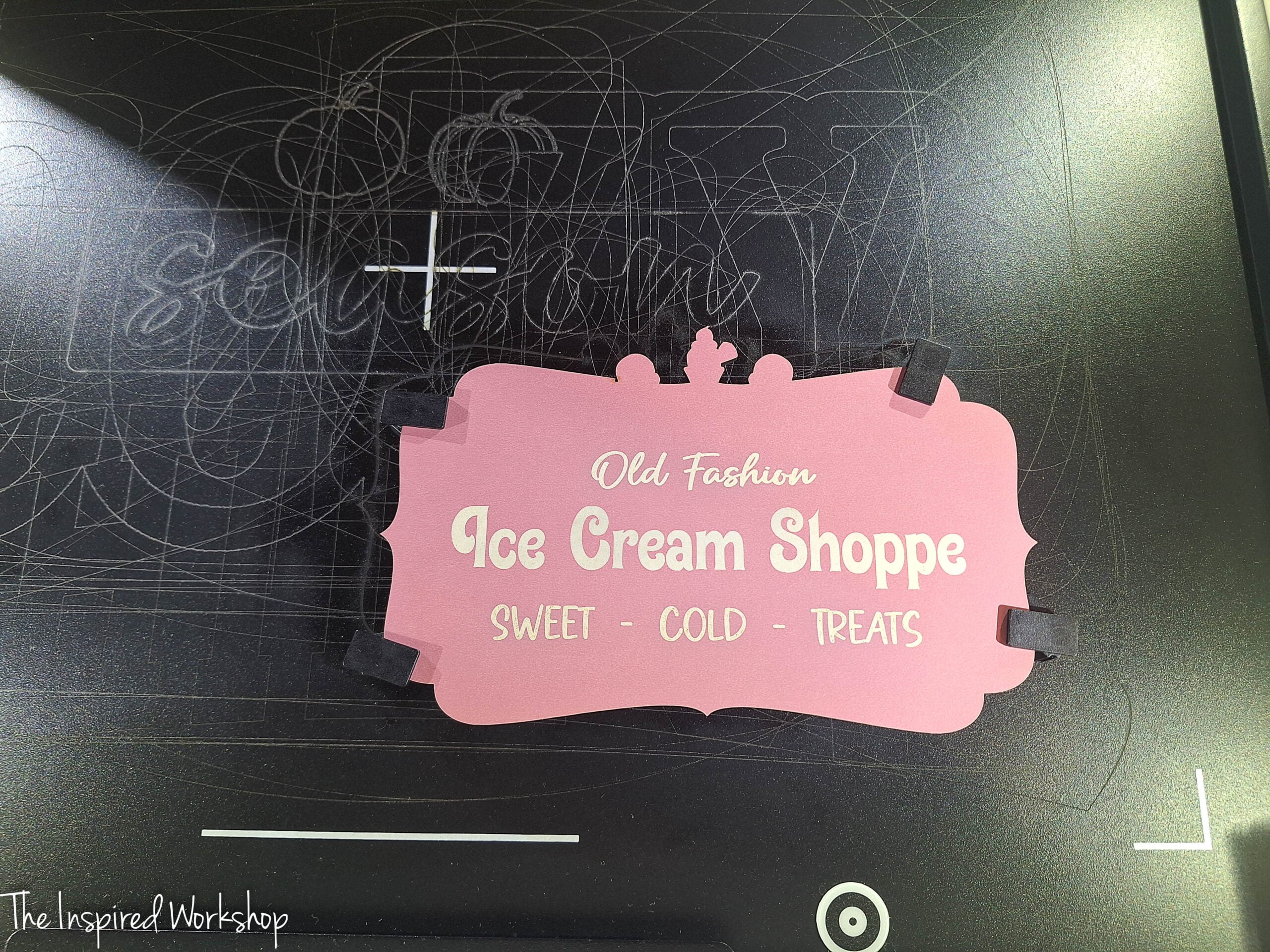 laser engraving on pink MDF that turns white when engraved