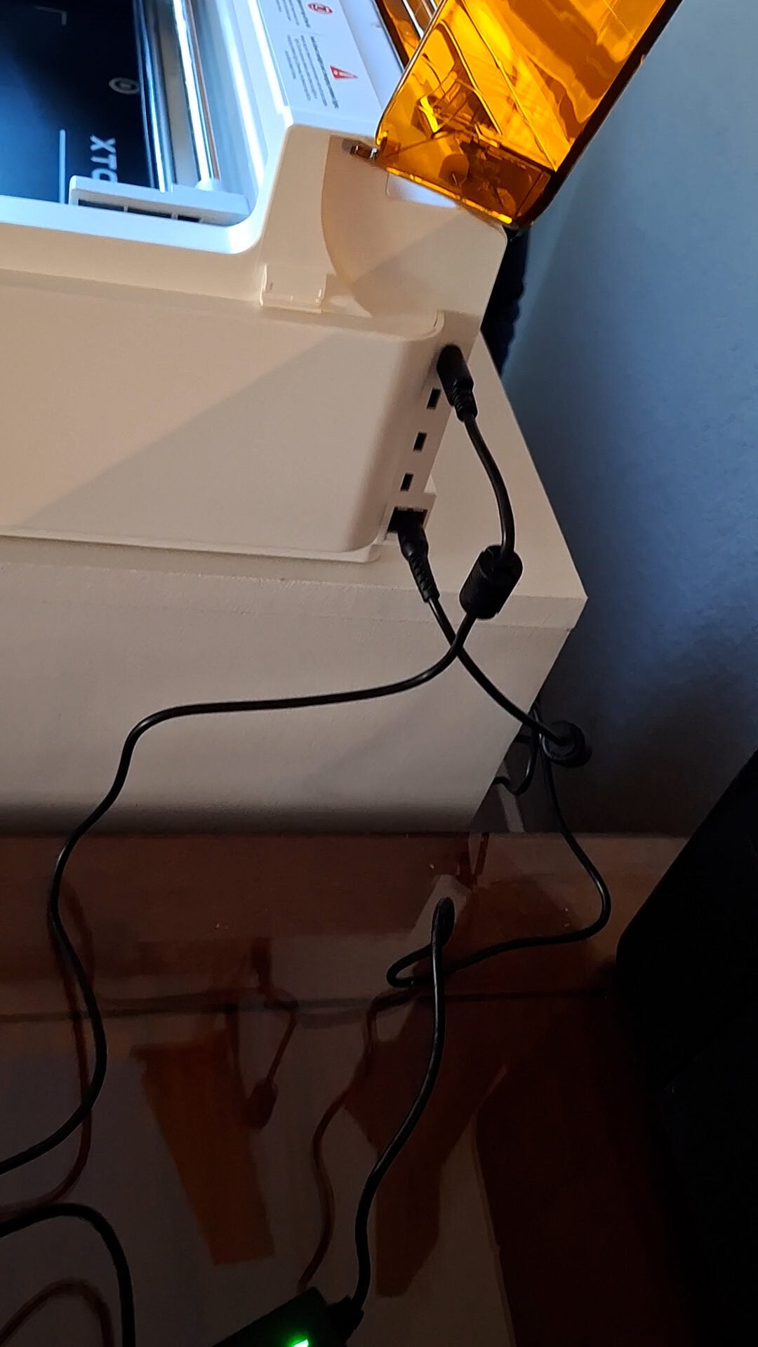 showing where the computer sync cable goes