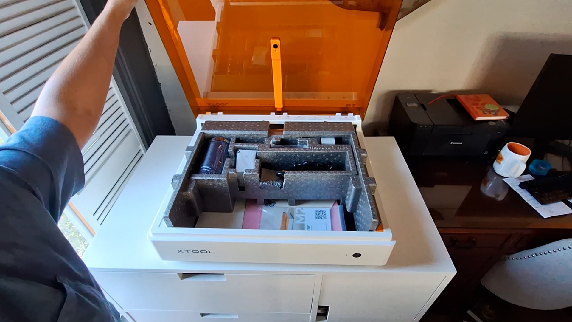looking inside the xTool M2 straight out of the box with everything nicely stored in the precision styrofoam