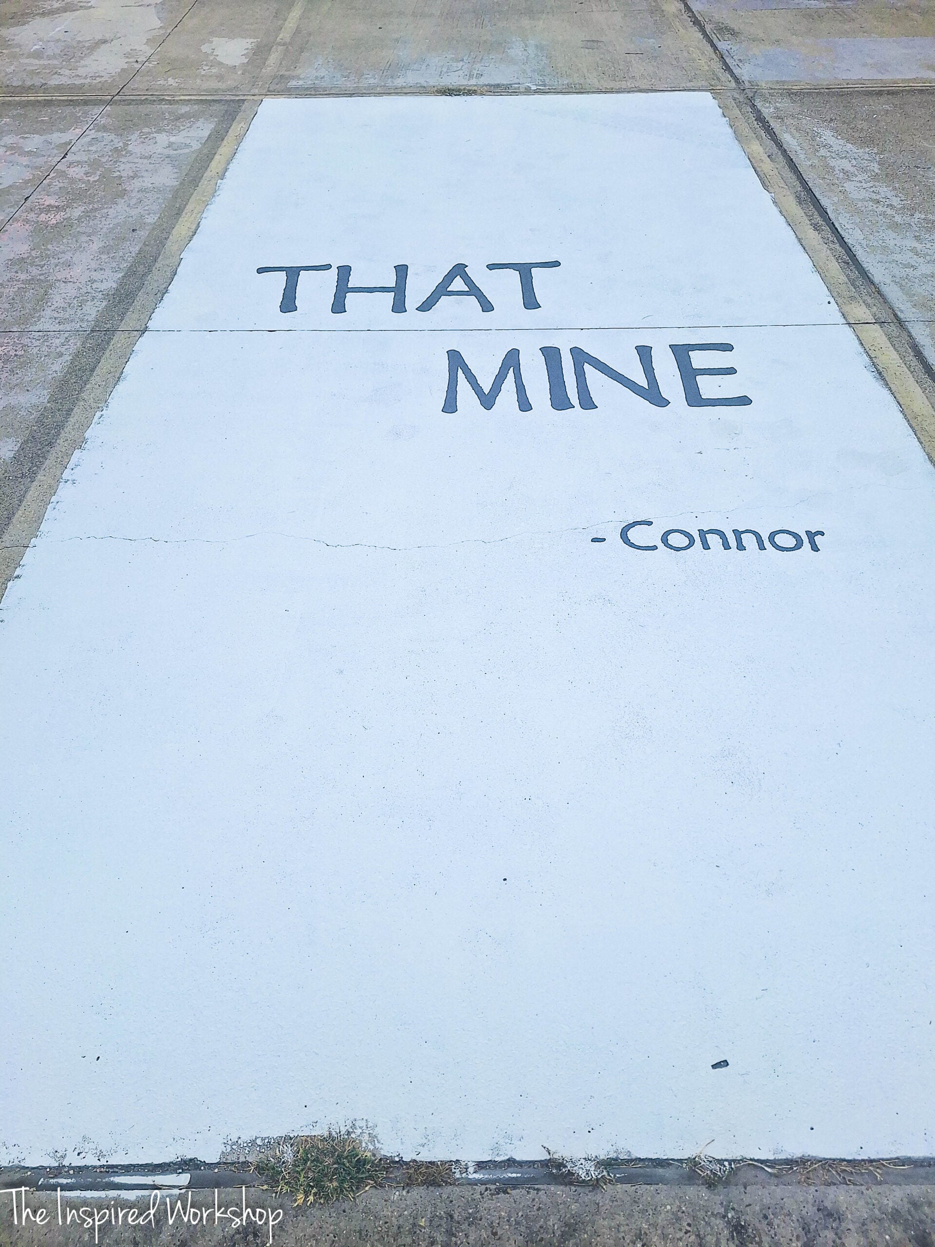 parking spot painted with the words "That Mine" with quote attribution to Connor